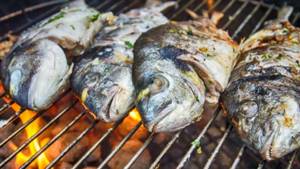 photo of fish on the grill