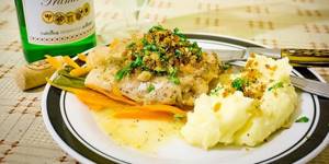 How to cook pike perch in the oven with vegetables and white wine