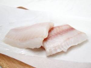 How to cut pollock after two fillets have been removed from the carcass?