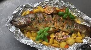 How to deliciously and quickly cook trout in the oven in foil with potatoes