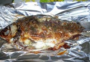 Crucian carp in the oven in foil, whole baking sleeve. Recipes with potatoes, mayonnaise, garlic, sour cream. Step by step 