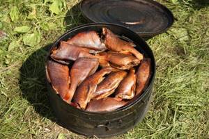 smoked fish in a cauldron