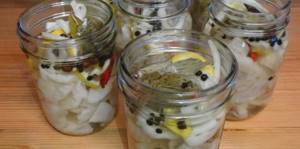 pieces of pickled silver carp in a jar