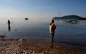 Fishing for omul and grayling in spring on Lake Baikal