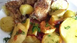 Sea bass with potatoes in the oven
