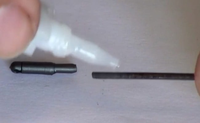 apply glue to the junction of the connector with the tip of the fishing rod
