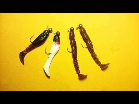 Placing a silicone bait on a jig head. Pike. Pike perch. Perch ...