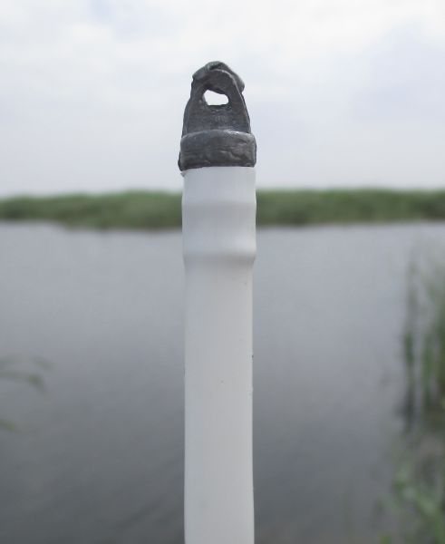The lower part of the sliding float with a fastening loop-weight made of lead