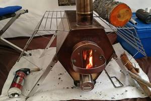 The Soputnik stove is installed in a tent