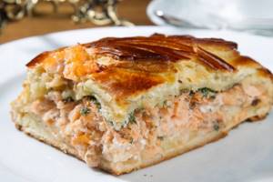 Pie with red fish and cheese