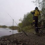 Fisherman with bottom fishing rods