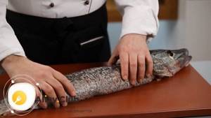 Watch how to stuff whole pike in the oven