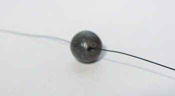 A hole is made in the pellet with a needle