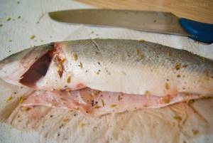 Baked Seabass in the oven with vegetables. Step by step recipe 