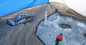 Winter crucian carp fishing in a tent